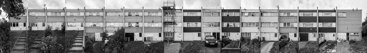 1970s Netherfield Estate housing design characterized by long white-walled terraces. Credit: architecturetoday.co.uk